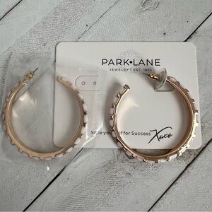 Gold hoop earrings.